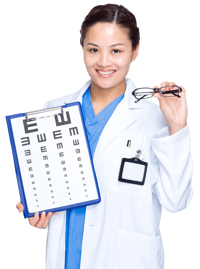An optometrist holding various eye exam instruments.
